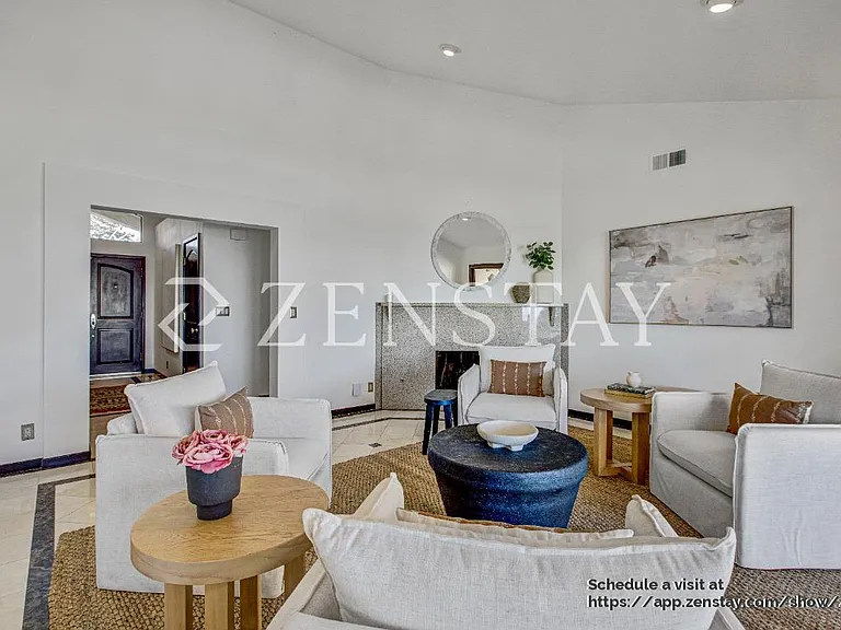 Sun-filled living area designed for comfort, gathering, and easy entertaining