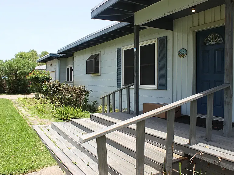 large front porch provides welcoming access