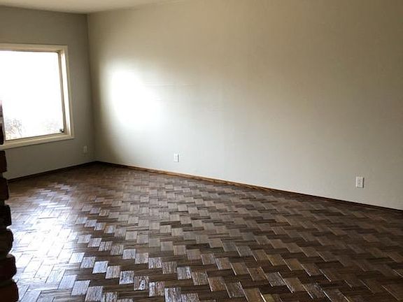 Living Room w/ original hardwood floors