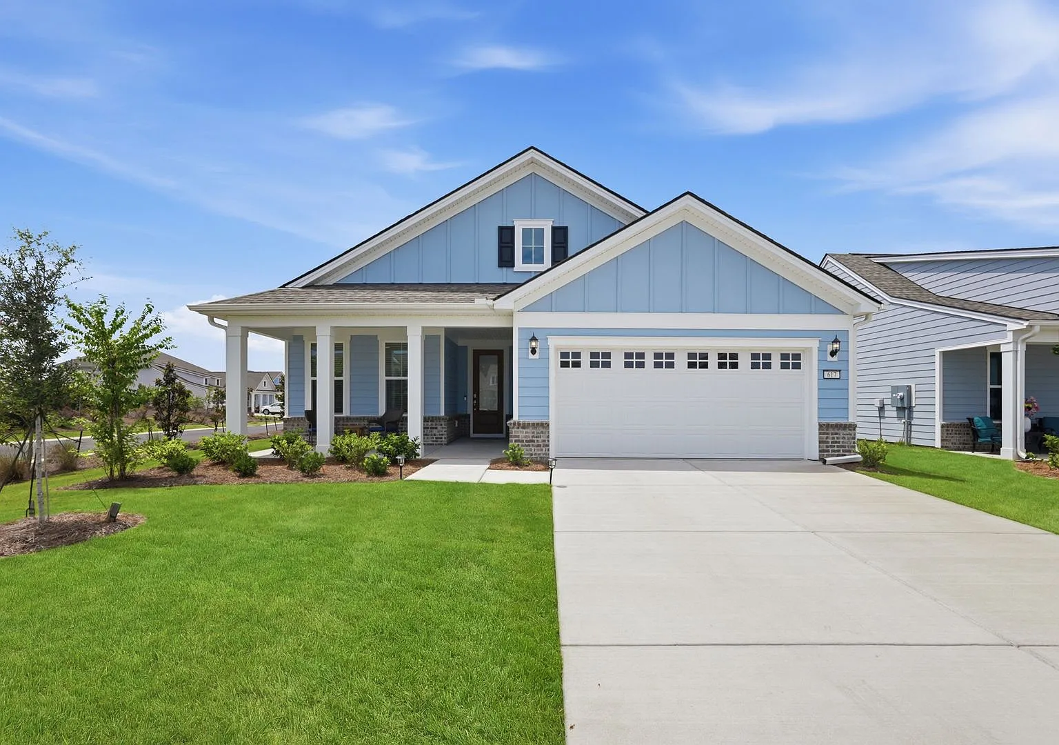 Modern Elegance Meets Resort-Style Living at 617 Eagle Landing Lane — Photo 2