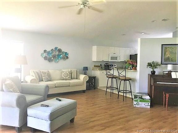 4th image of 3486 SW Pindo Palm Ln