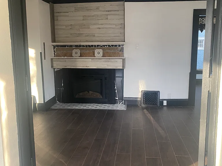 picture from sunny room facing the fire place