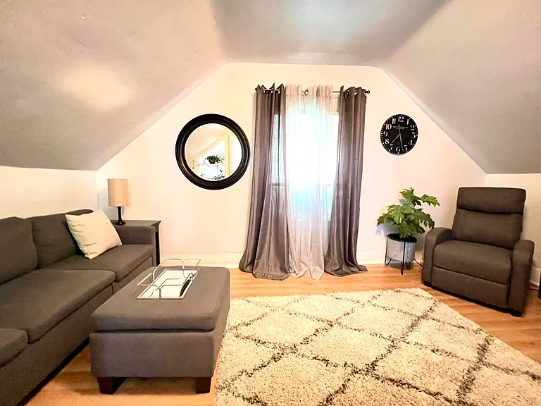 Your own private upstairs. Small living room.