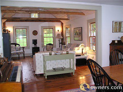 Great Room w/ vaulted ceilings and beams