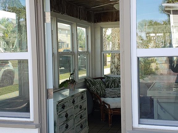 Front Door leading into Florida room area