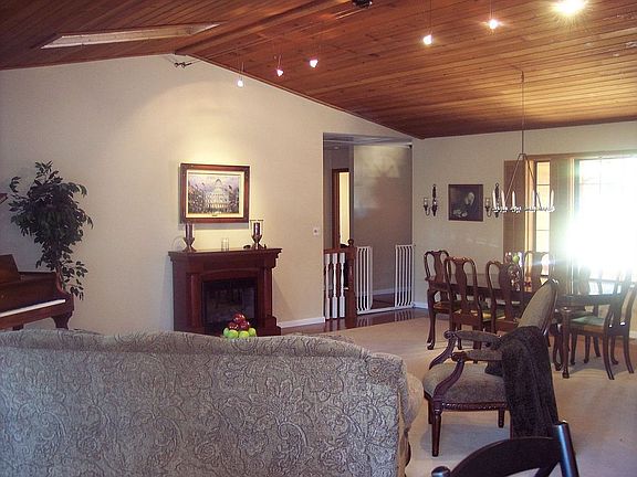 Great room style with skylights-wood ceilings-deck access