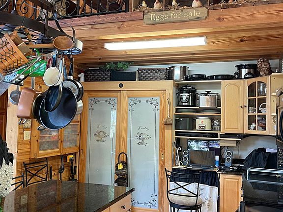 Country Kitchen pantry with space for office computer.