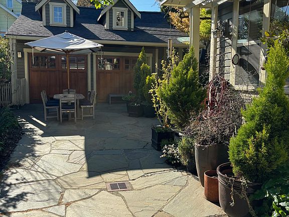 Back yard "Carriage House" opens to shared patio space