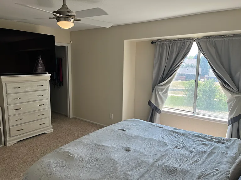 Owner's suite has views out back with a walk-in closet