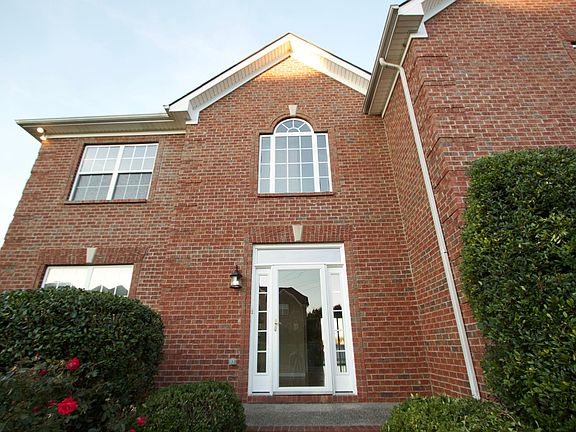 Inviting Entry with New Door and Mature Landscaping