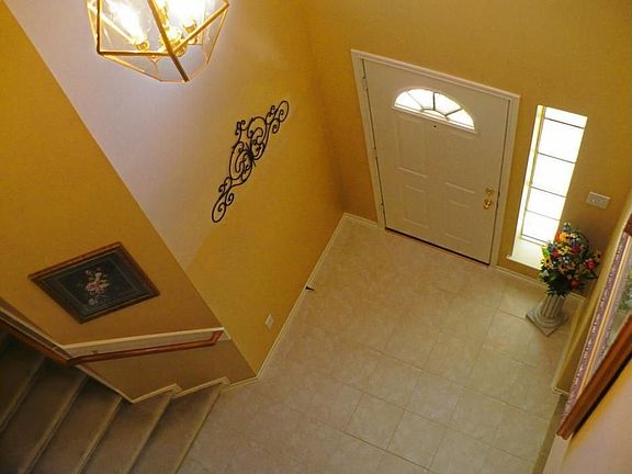 Two-Story Foyer with Suspended Chandelier