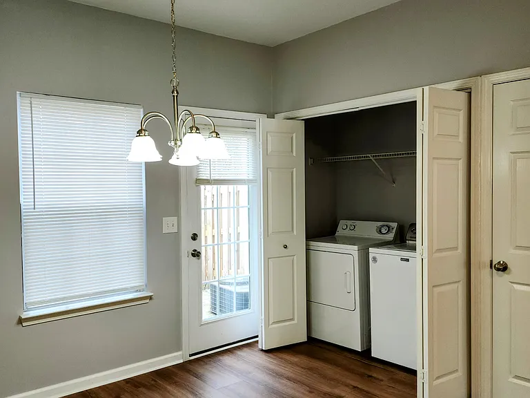 Kitchen showing washer and dryer