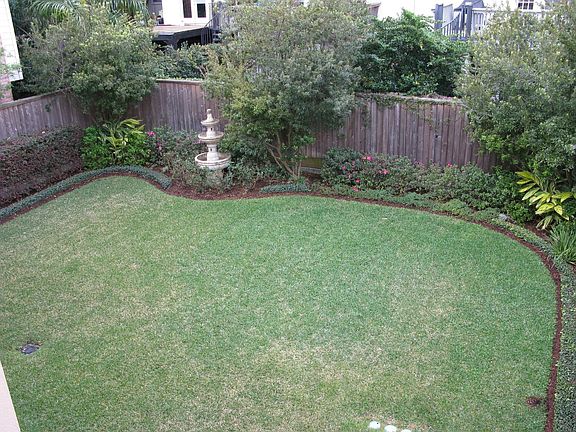Incredible back yard with a lovely fountain. Great place for a future pool!