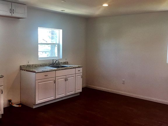 Huge kitchen and living room space perfect for entertaining.