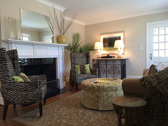 fireplace with door to porch