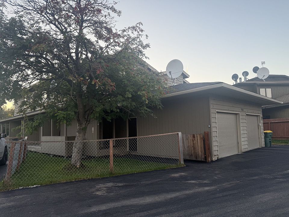Outside of unit with fully fenced yard.