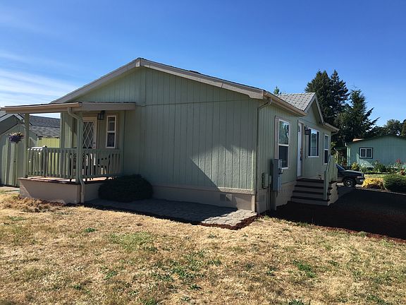 Back w/patio & extra shed