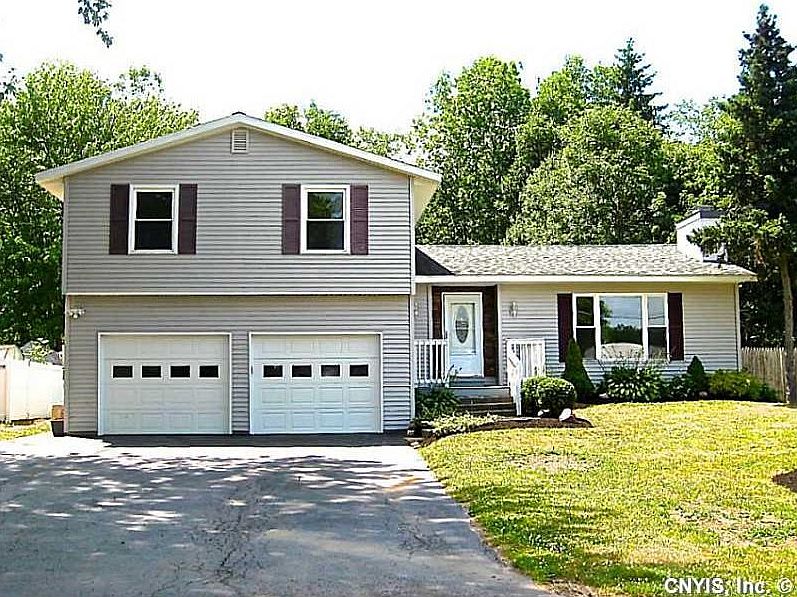 Exterior Front. Five years young roof and siding! Large driveway and garage!