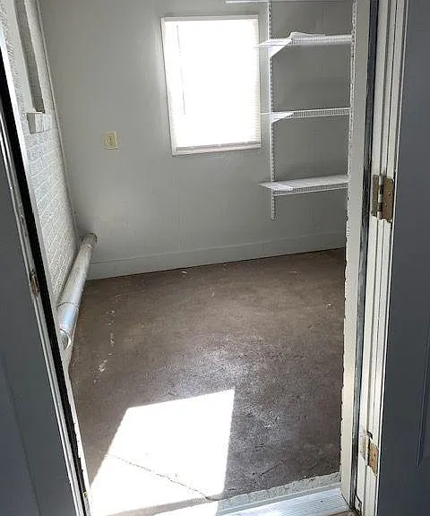 Interior storage room off of the family room.