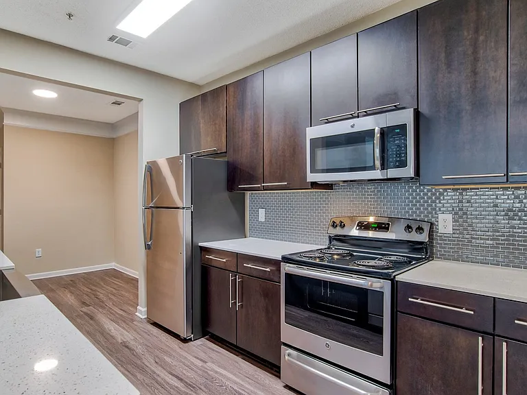 Custom cabinetry and stainless steel appliances