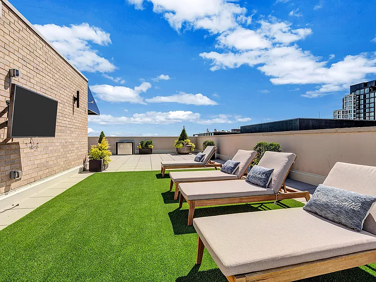 Rooftop with turf and blue sky