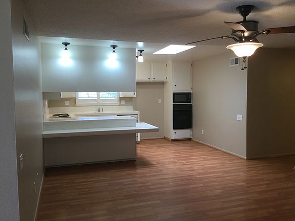 Family Room and Living Room are only Steps Away from Kitchen