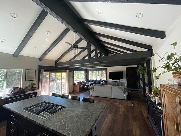 Kitchen and upstairs living space 1 of 4