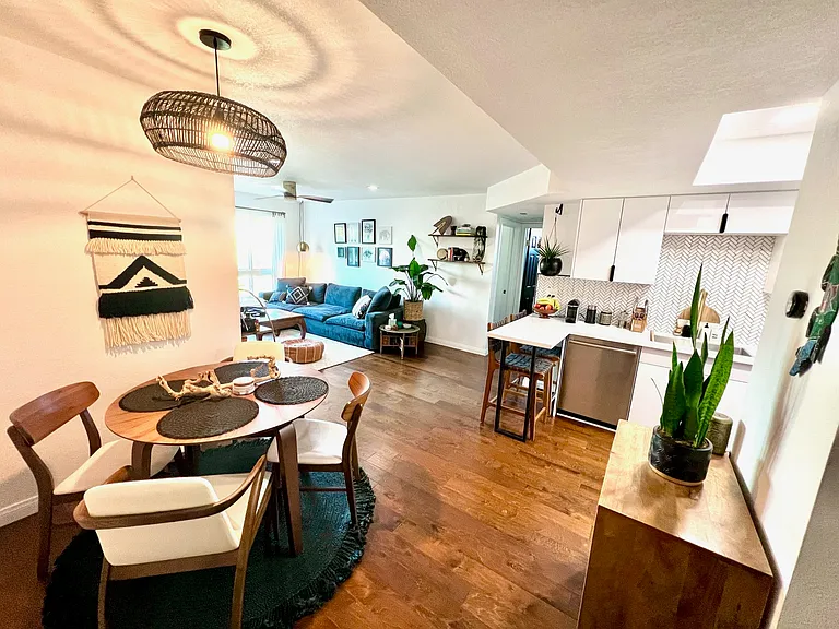 View from Entryway, Dining Area, Living Room, Kitchen Peninsula (For Inspiration Only; Comes Unfurnished, these are the old floors)
