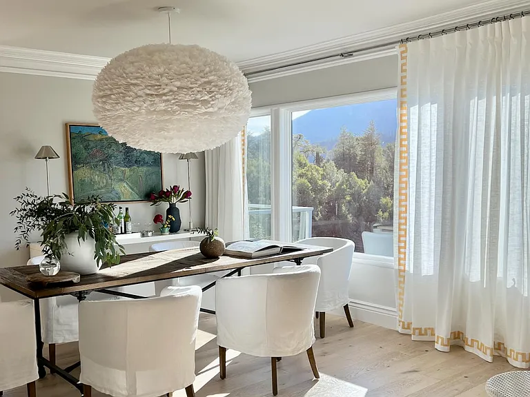 View-facing Dining Room adjacent to the Kitchen and Living Room