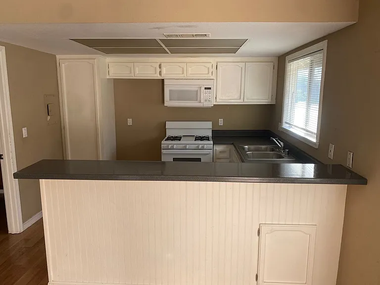 5748 Tilton Ave — Photo 21