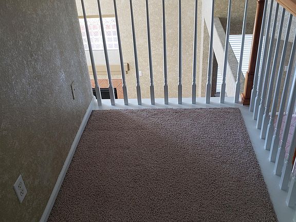 Loft; view down to the living room/fireplace