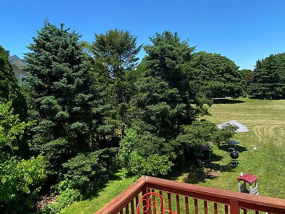 Have breakfast looking at distance water views and huge back yard