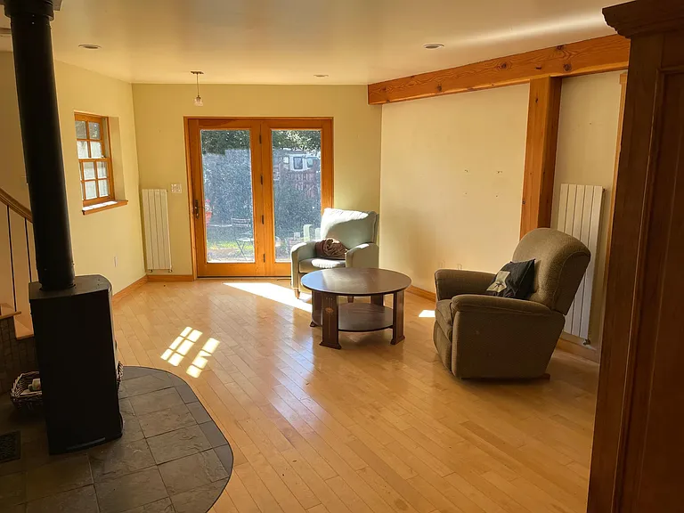 Living room with doors to yard.