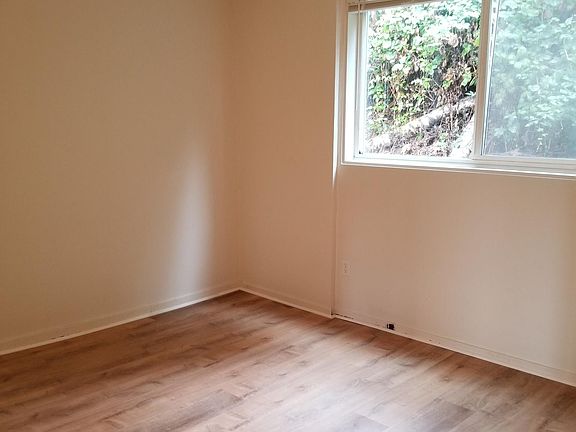 Bedroom backs to a hill and is private