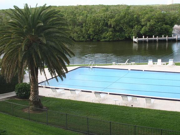 View from dining area - gorgeous pool for swimming laps.