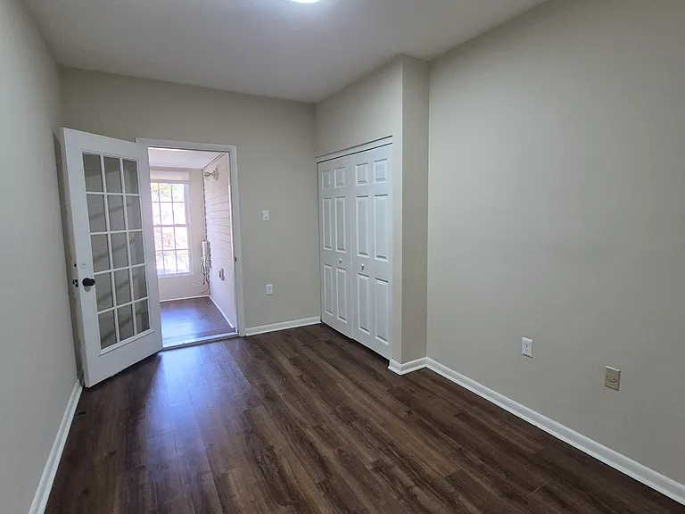 Large primary bedroom with bonus sunroom.