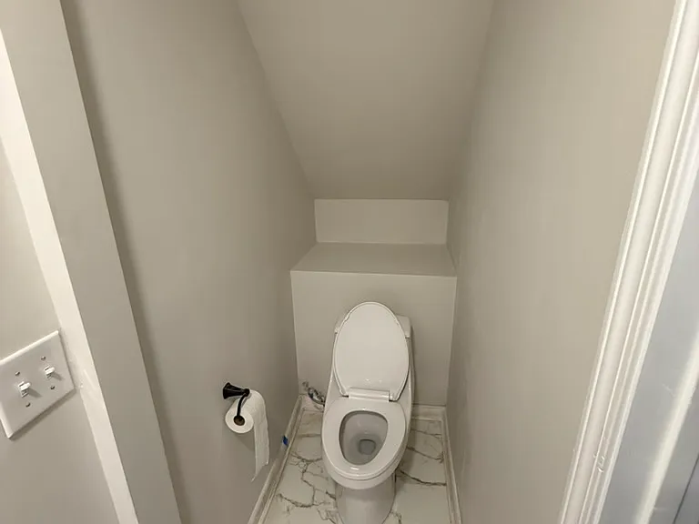 Half bath downstairs attached to living room