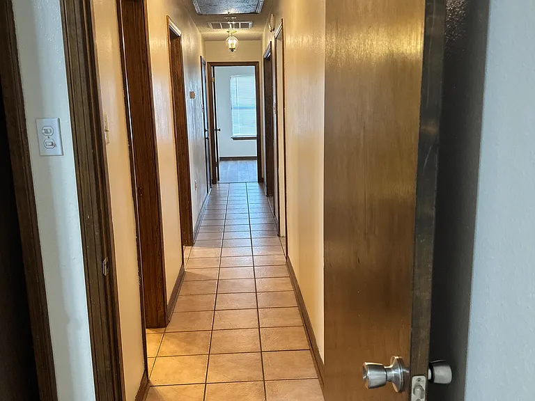 Looking down the hallway towards the master bedroom