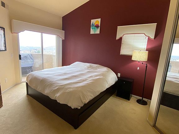 Master Bedroom, w/ access to balcony