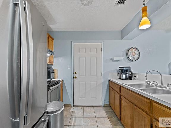 5th image of 2722 Fan Palm Dr E