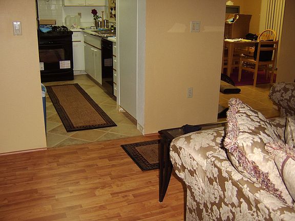 Living room looking to kitchen/dining room