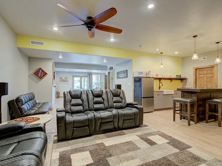 Basement includes a small kitchen equipped with most everything you need to entertain.