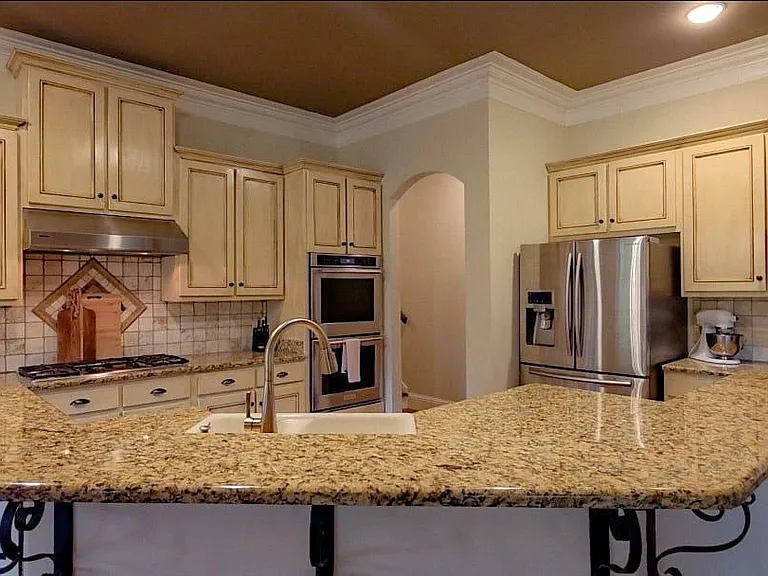 Chef's kitchen, range, double ovens, microwave, Refrigerator and Dishwasher