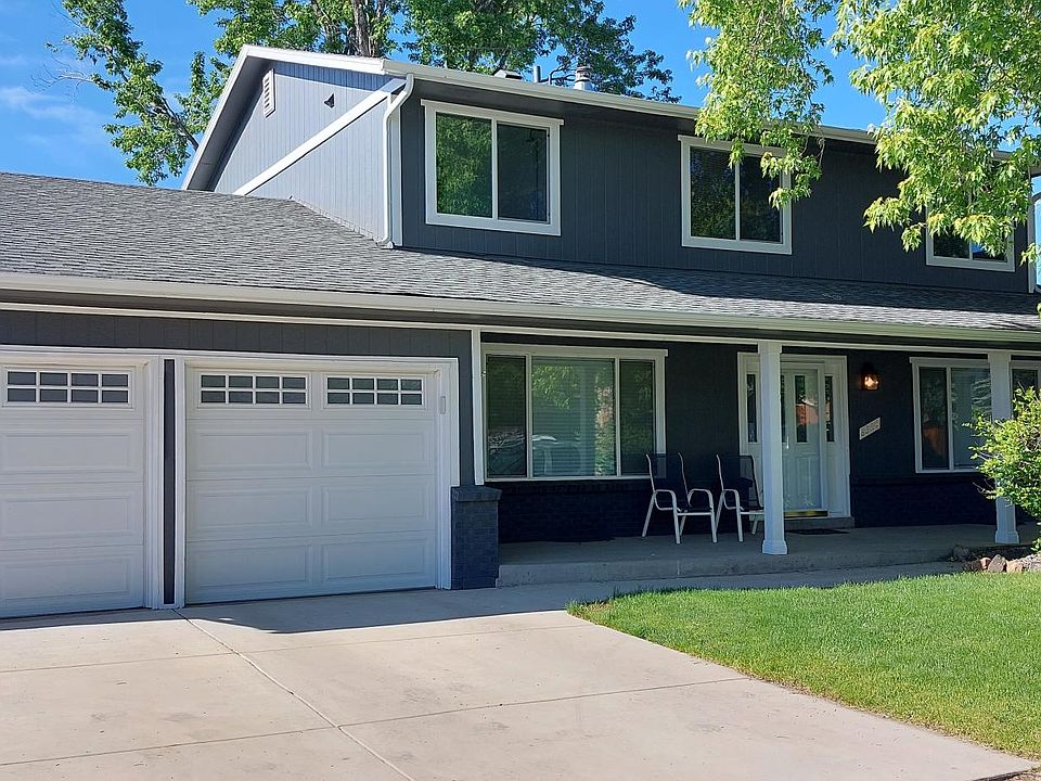 Front view of home with large covered porch. All new windows and freshly painted.