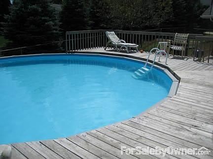 Pool and deck : 27 foot round and 52 inch deep