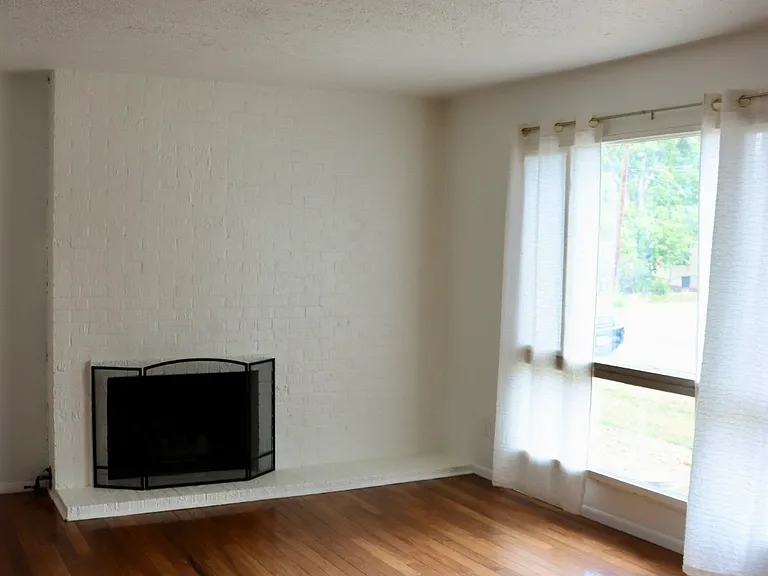 Main Living room, big open window with lots of natural light.