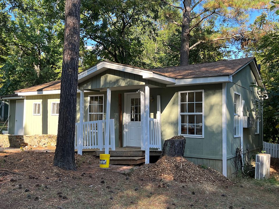 Rear Entry facing farm area and nearby neighbor.
