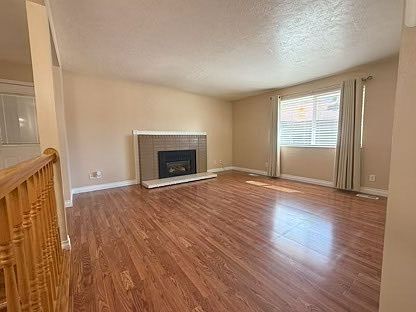 Main floor: Living room with fireplace.