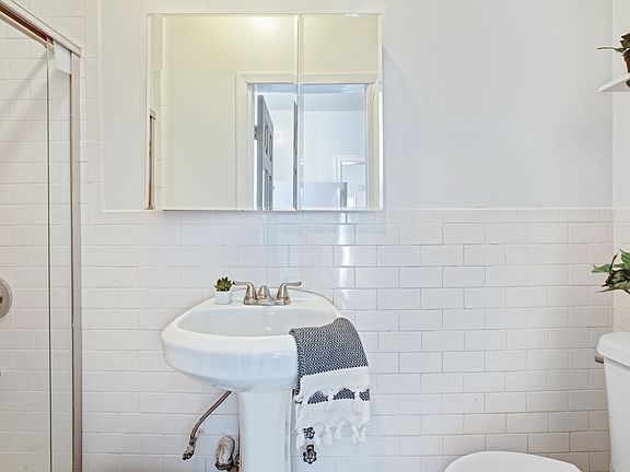 5th image of 327 E 3rd St APT 3A