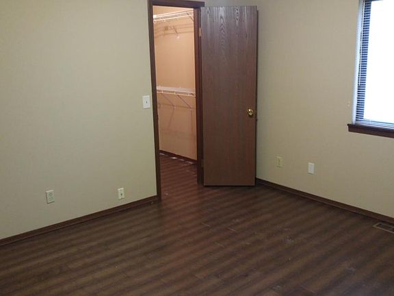 Master bed with walk-in closet